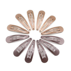 Dofash clips beside a makeup bag for travel-ready convenience