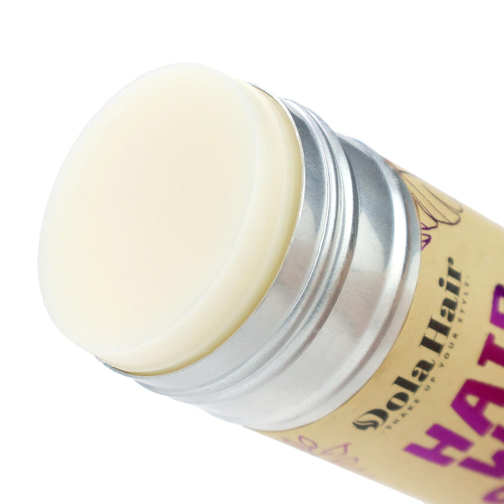 dolahair beside a coin showing compact size and easy storage benefit