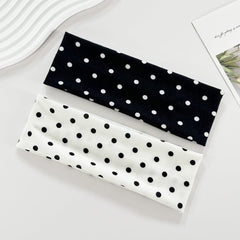 Doneace front view of two polka dot headbands showing patterns and fit benefit