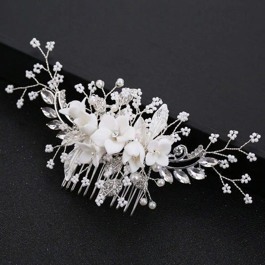 DonLeeving front view of silver bridal comb showing elegant floral design and secure comb teeth for stable hold
