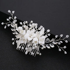 DonLeeving front view of silver bridal comb showing elegant floral design and secure comb teeth for stable hold