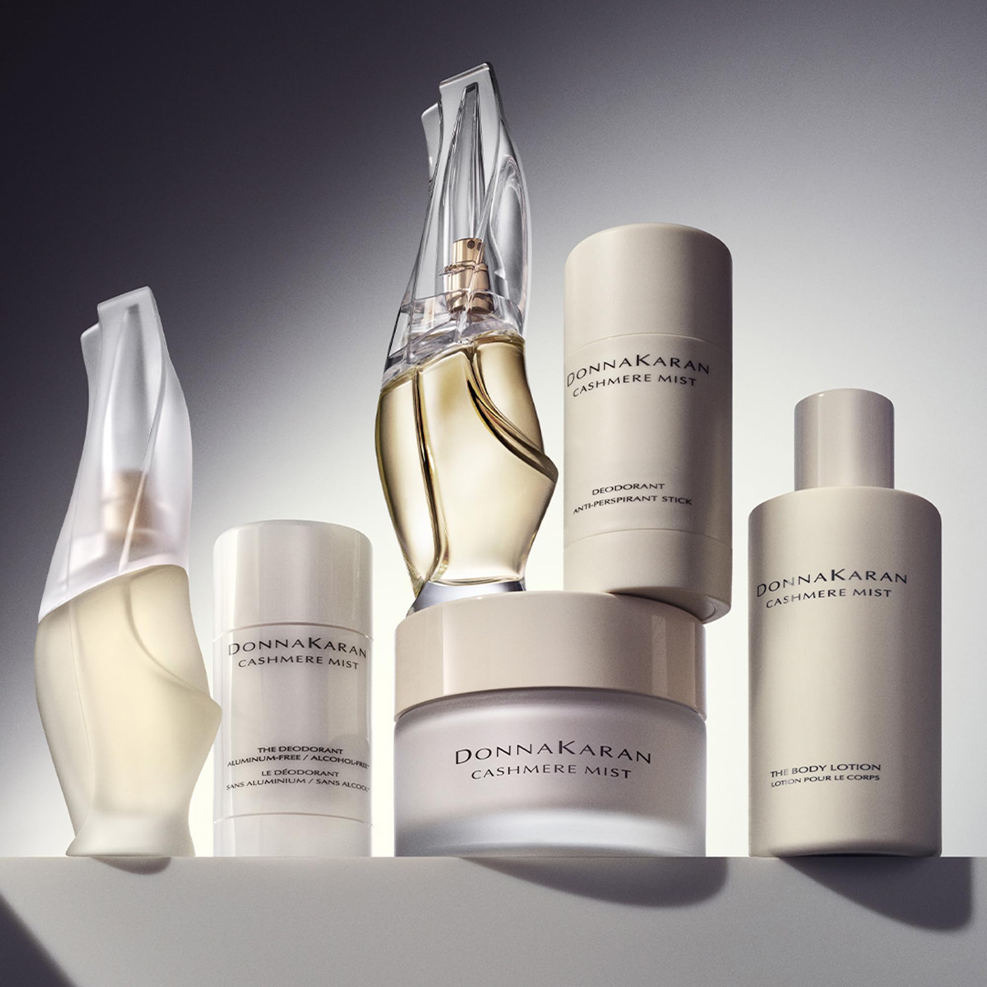 Donna Karan Cashmere Mist being applied to hand for instant softening