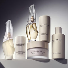Donna Karan Cashmere Mist being applied to hand for instant softening