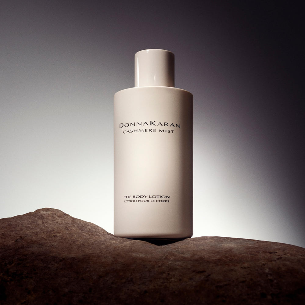 Donna Karan Cashmere Mist lotion texture close-up demonstrating smooth absorption