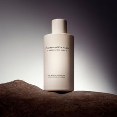 Donna Karan Cashmere Mist lotion texture close-up demonstrating smooth absorption