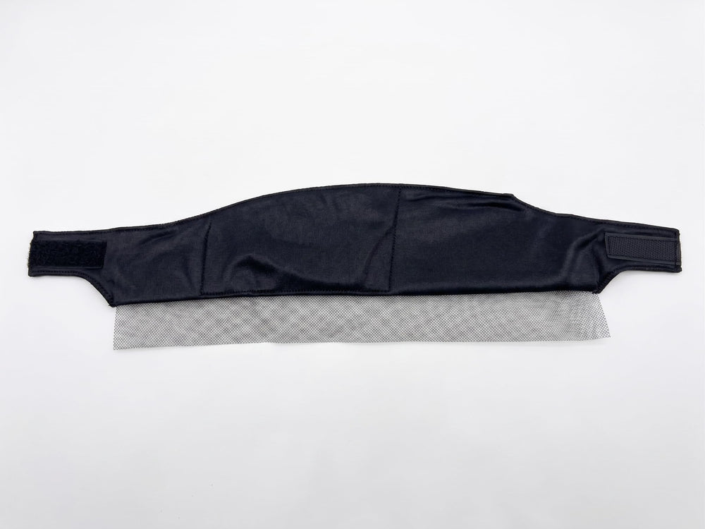 DONNA wrap next to hand for size comparison demonstrates one-size-fits-most convenience