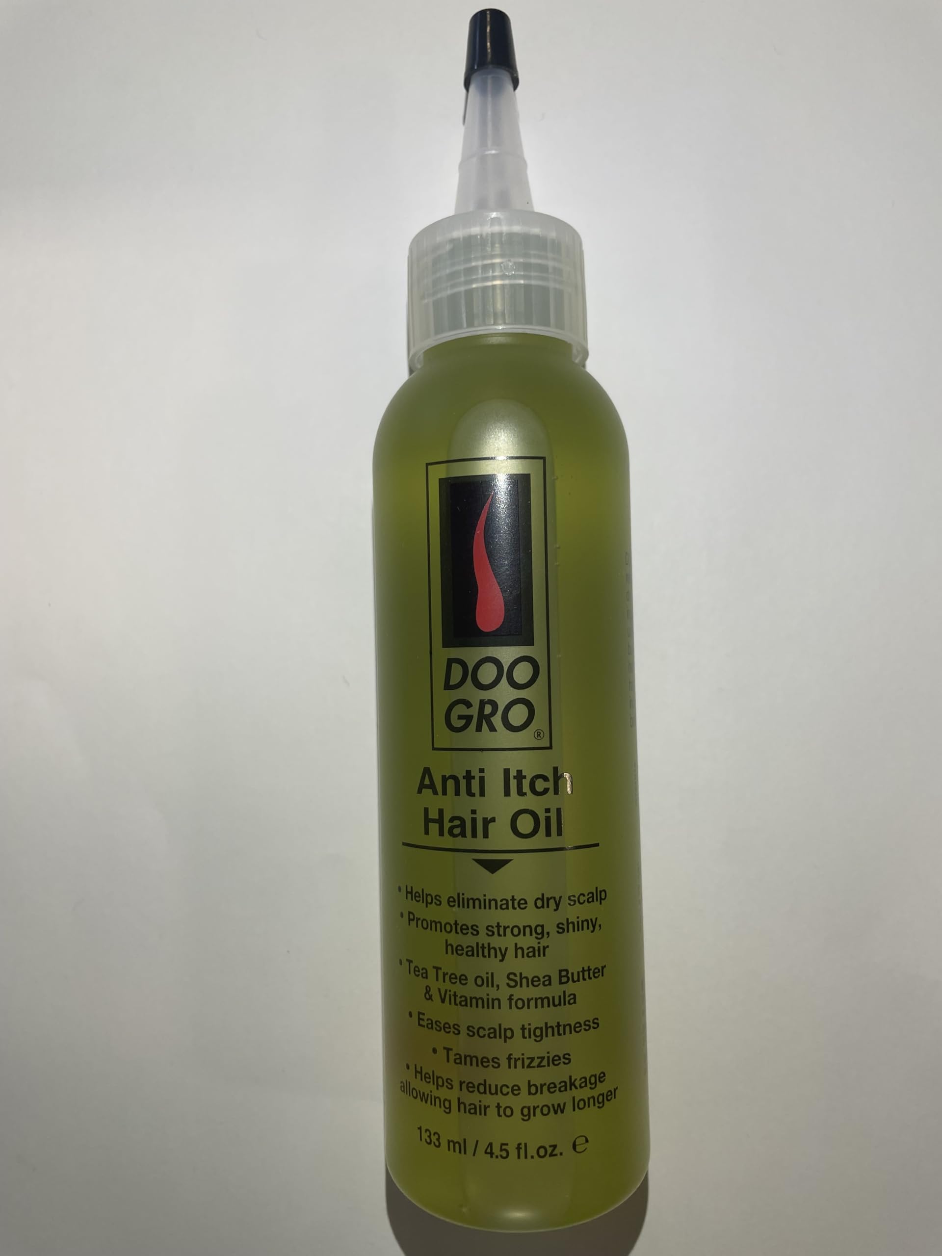 Doo Gro being applied to scalp demonstrating targeted itch relief