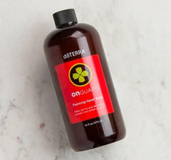 doTERRA refill pouring into a foaming dispenser for quick refill convenience