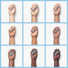 Double Rhythm painted nail tip in light blue demonstrating sheer color effect