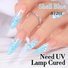 Double Rhythm Candy Blue applied on nails demonstrating reflective sparkle and salon gloss