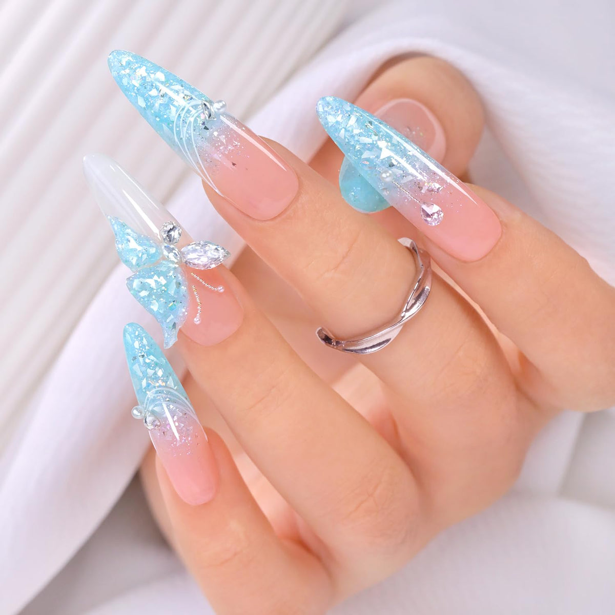 Double Rhythm Candy Blue front bottle showing vibrant glitter polish and easy-to-hold cap benefit