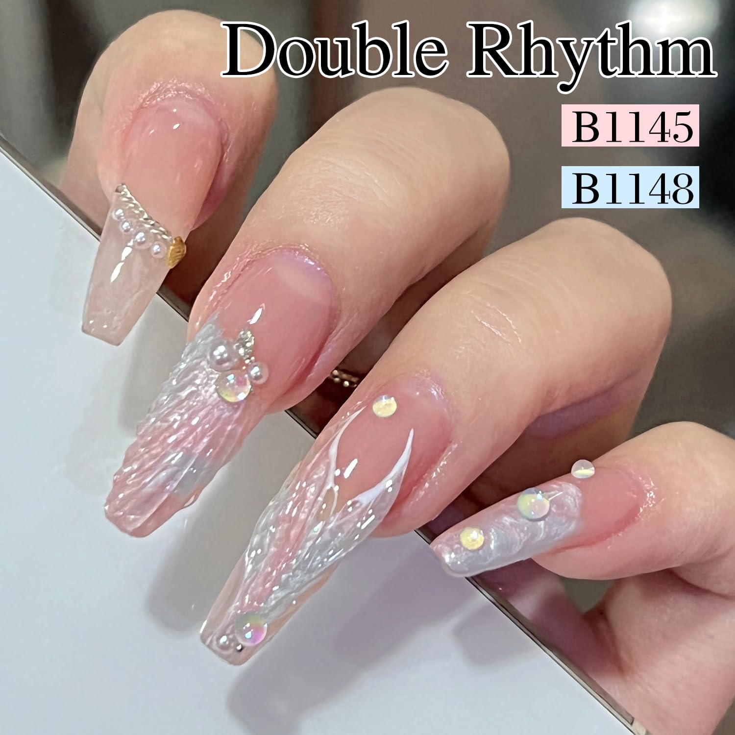 Double Rhythm color swatches on a hand showcasing pearly pastel finish and versatility