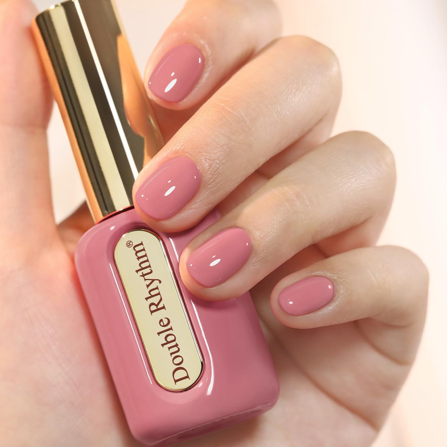 Double Rhythm front bottle showing coral pink shade and easy identification