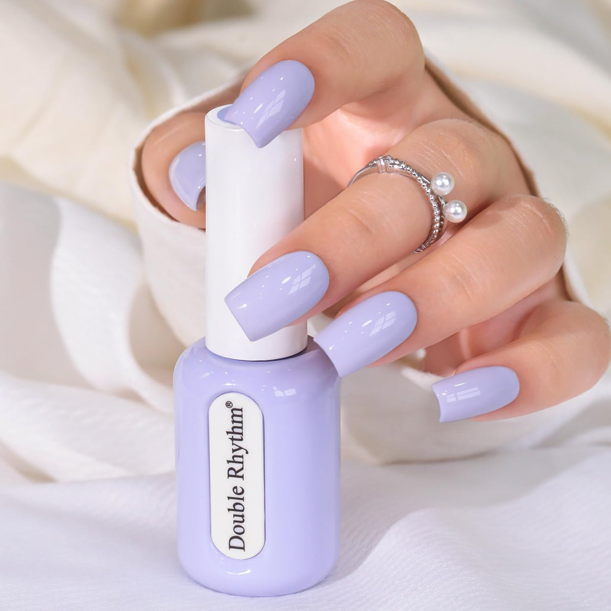 Double Rhythm dusty lavender front bottle shows color and neat packaging benefit