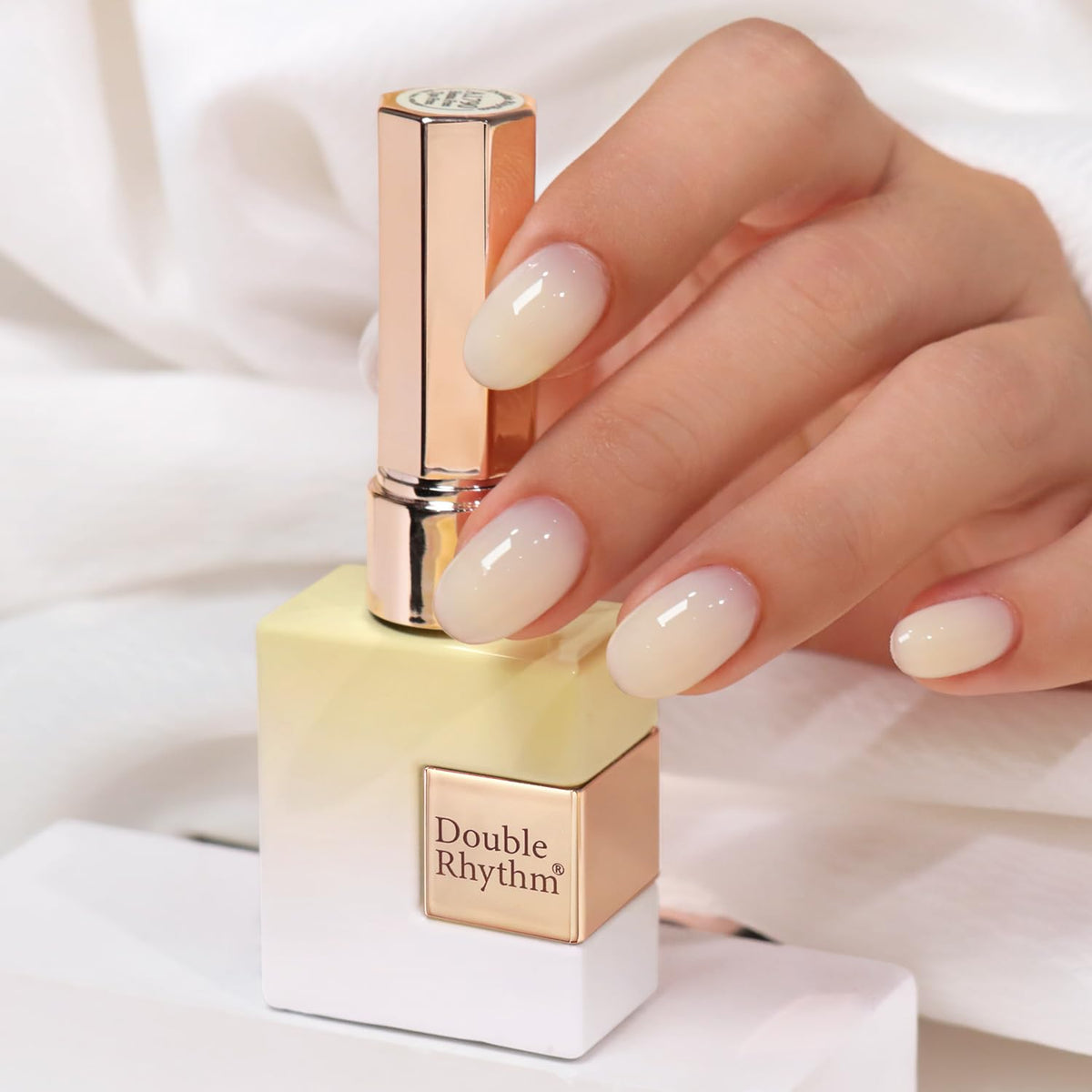 Double Rhythm front bottle showing milky beige shade and true color