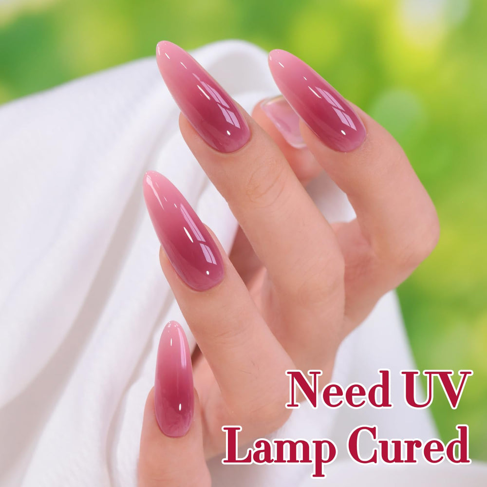 Double Rhythm two-layer manicure on nails showing soft plum translucence and gloss