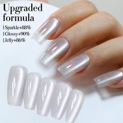 Double Rhythm magnet held above wet polish showing cat-eye shimmer and directional effect