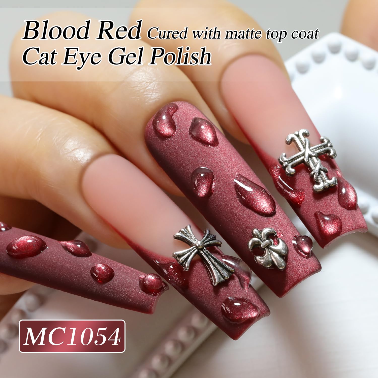 Double Rhythm magnet held over wet polish creating sharp cat-eye shimmer band