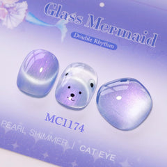 Double Rhythm Mermaid Blue magnet held over wet gel demonstrating cat-eye effect