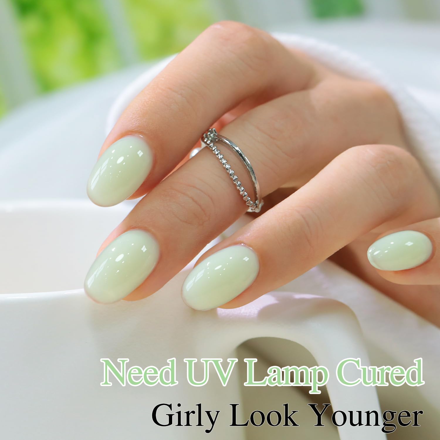 Double Rhythm cured nails under LED lamp demonstrating durable glossy finish
