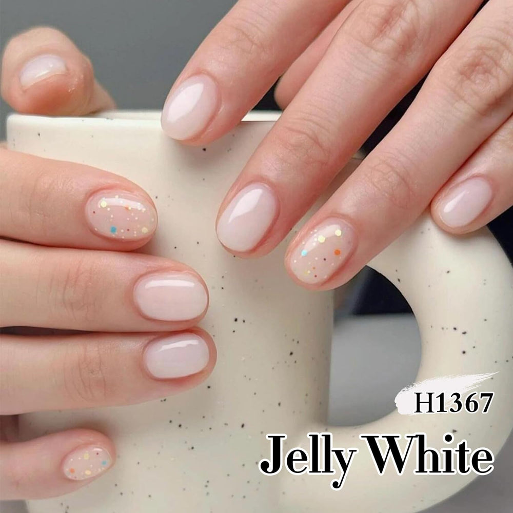 Double Rhythm bottle in hand to show 15ml scale and travel-friendly size for DIY mani