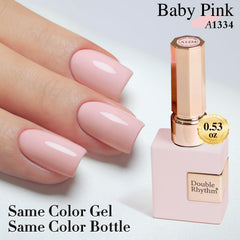 Hand model wearing Double Rhythm baby pink nails showcasing wearable, professional finish