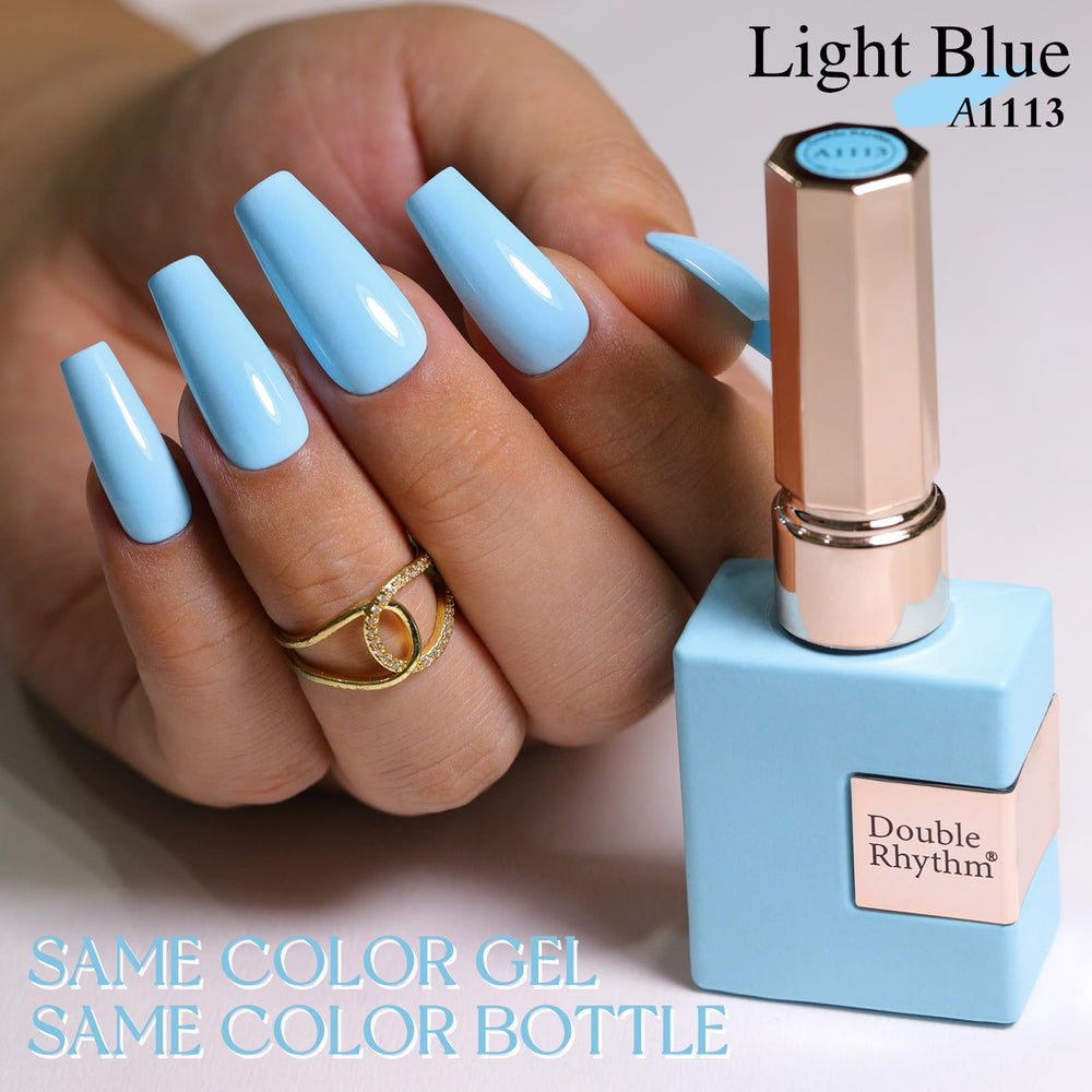 Double Rhythm brush dipped in light blue showing smooth application control