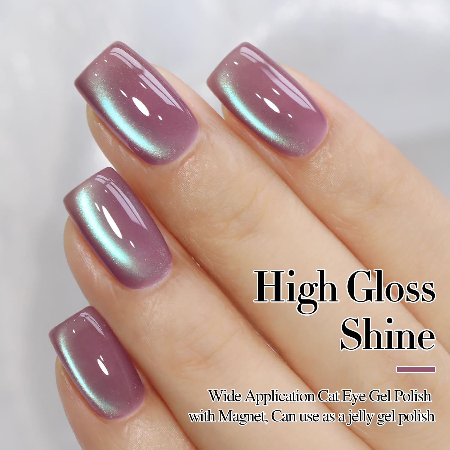Double Rhythm magnet held over wet gel creating a crisp cat-eye line