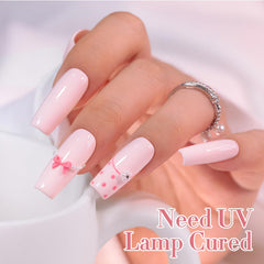 Double Rhythm swatch on fingertips showing wearable translucent nude and natural finish