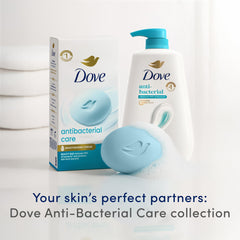 Dove antibacterial bar on bathroom shelf suggesting soft, hydrated skin