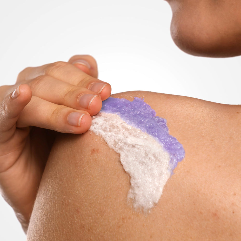 Dove being applied on wet arm demonstrating gentle exfoliation and instant smoothing