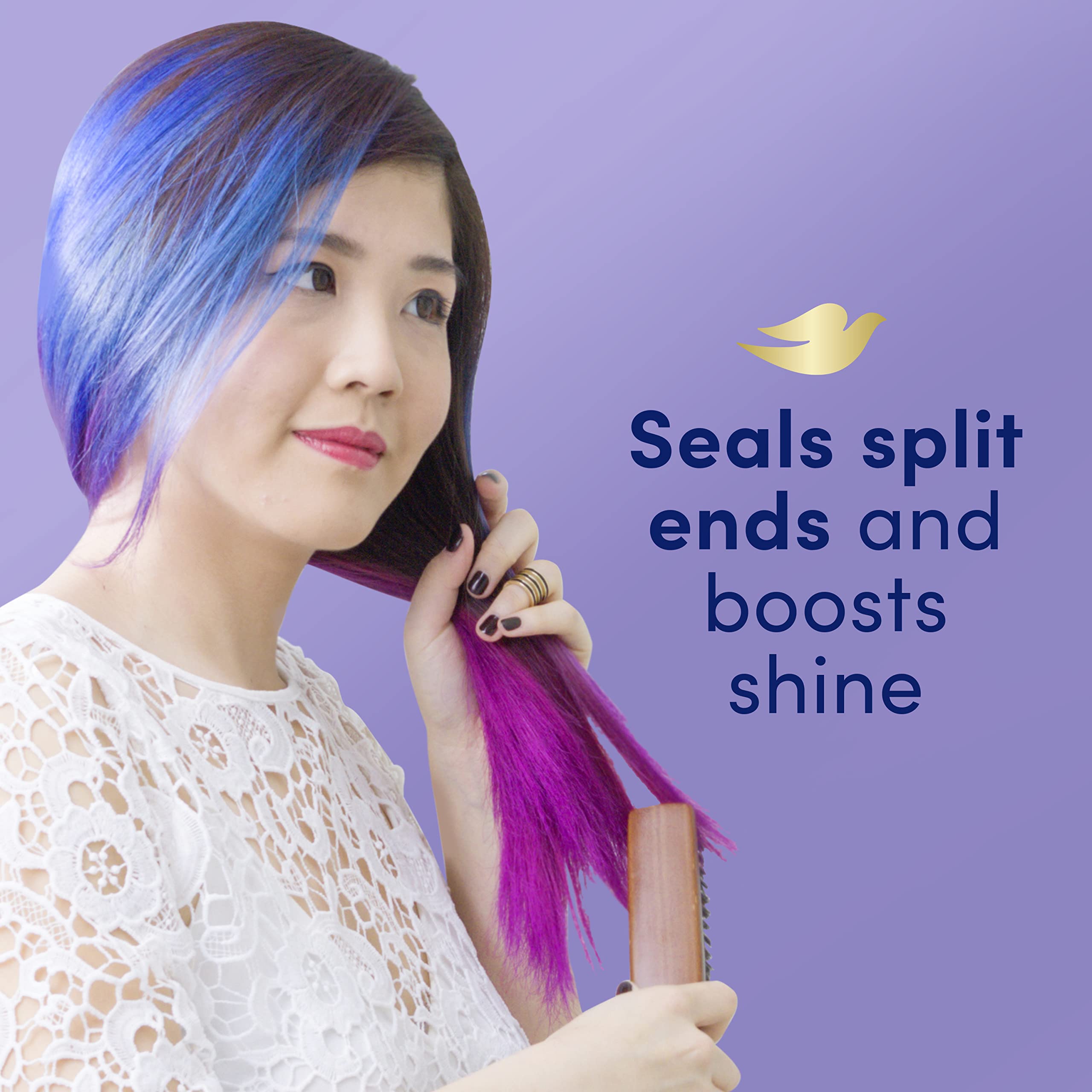 Applying Dove serum to damp hair for smoothness and frizz control