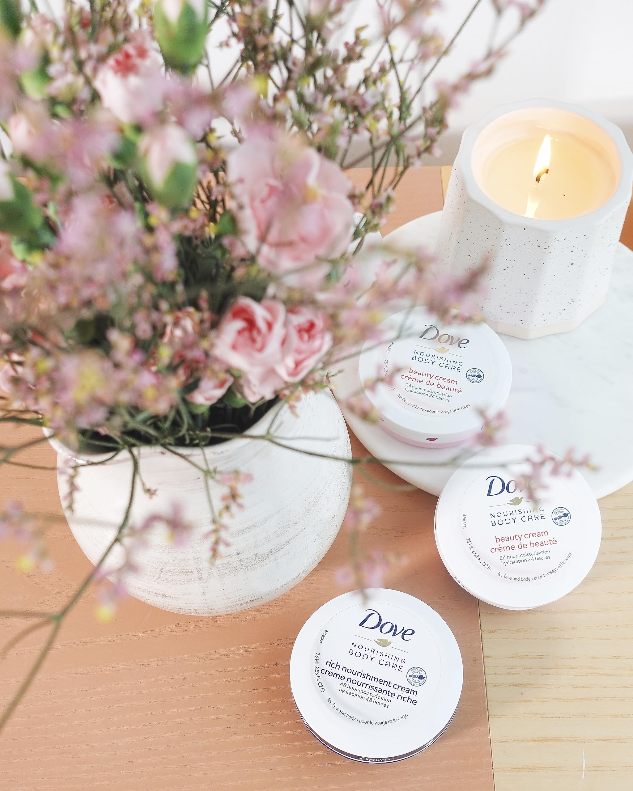 Four Dove 2.53 oz jars grouped to show convenient multi-pack value