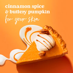 Pumpkin and cinnamon ingredients styled beside Dove bottle showing warm fragrance