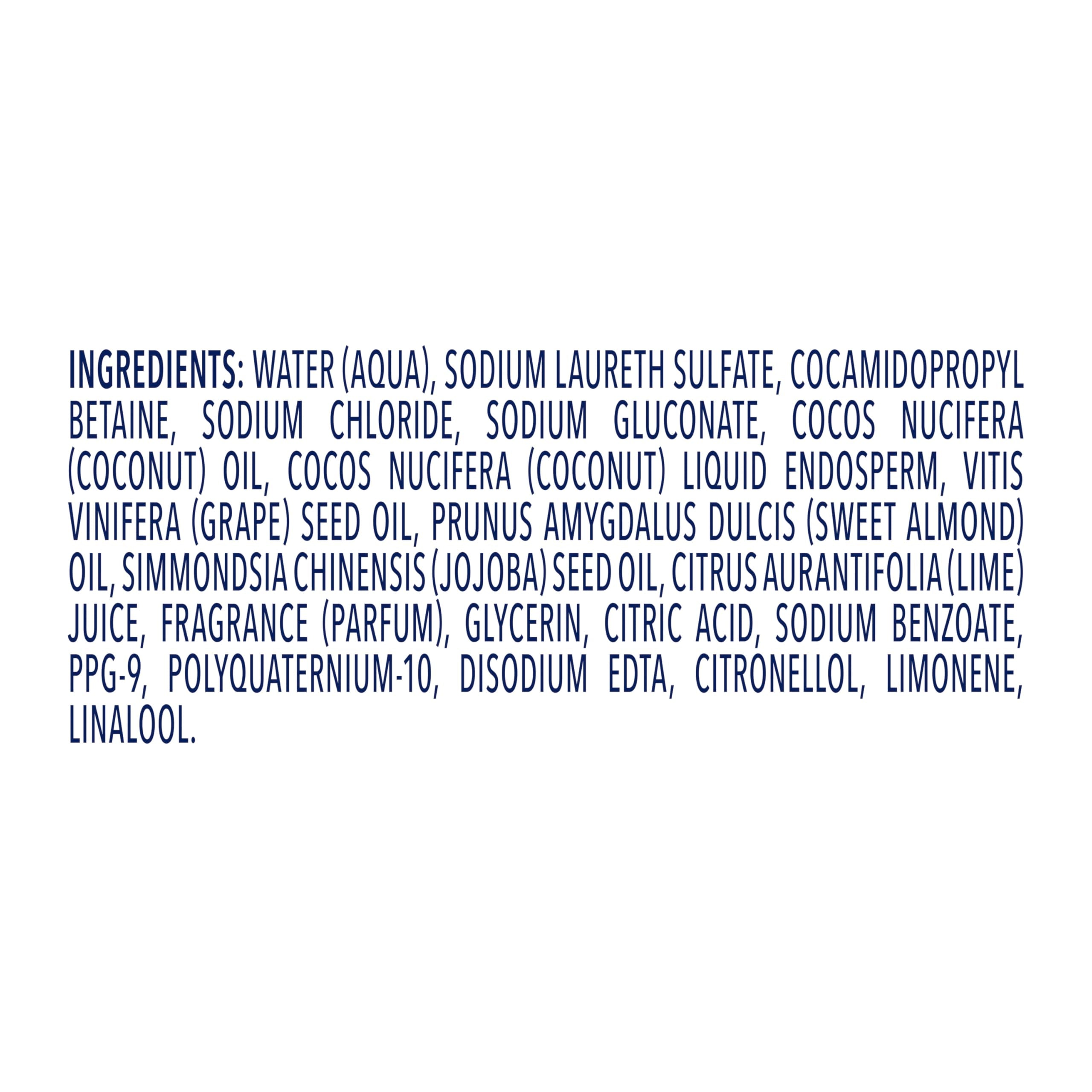 Coconut halves beside Dove bottle emphasizing coconut oil ingredient and moisturizing effect