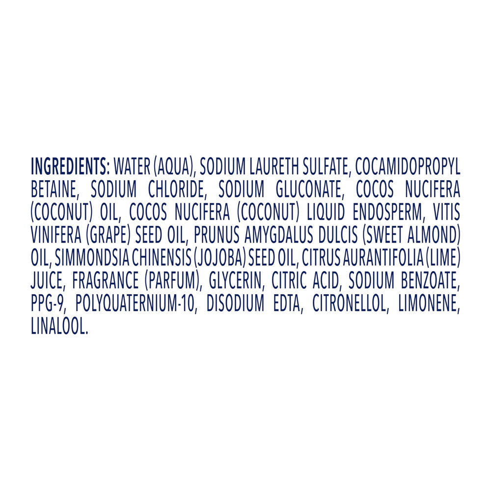 Coconut halves beside Dove bottle emphasizing coconut oil ingredient and moisturizing effect