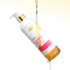 Dove shower oil pour on hand showing easy-to-use, hydrating feel
