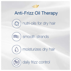 Dove conditioner being applied to mid-lengths demonstrating smoother hair
