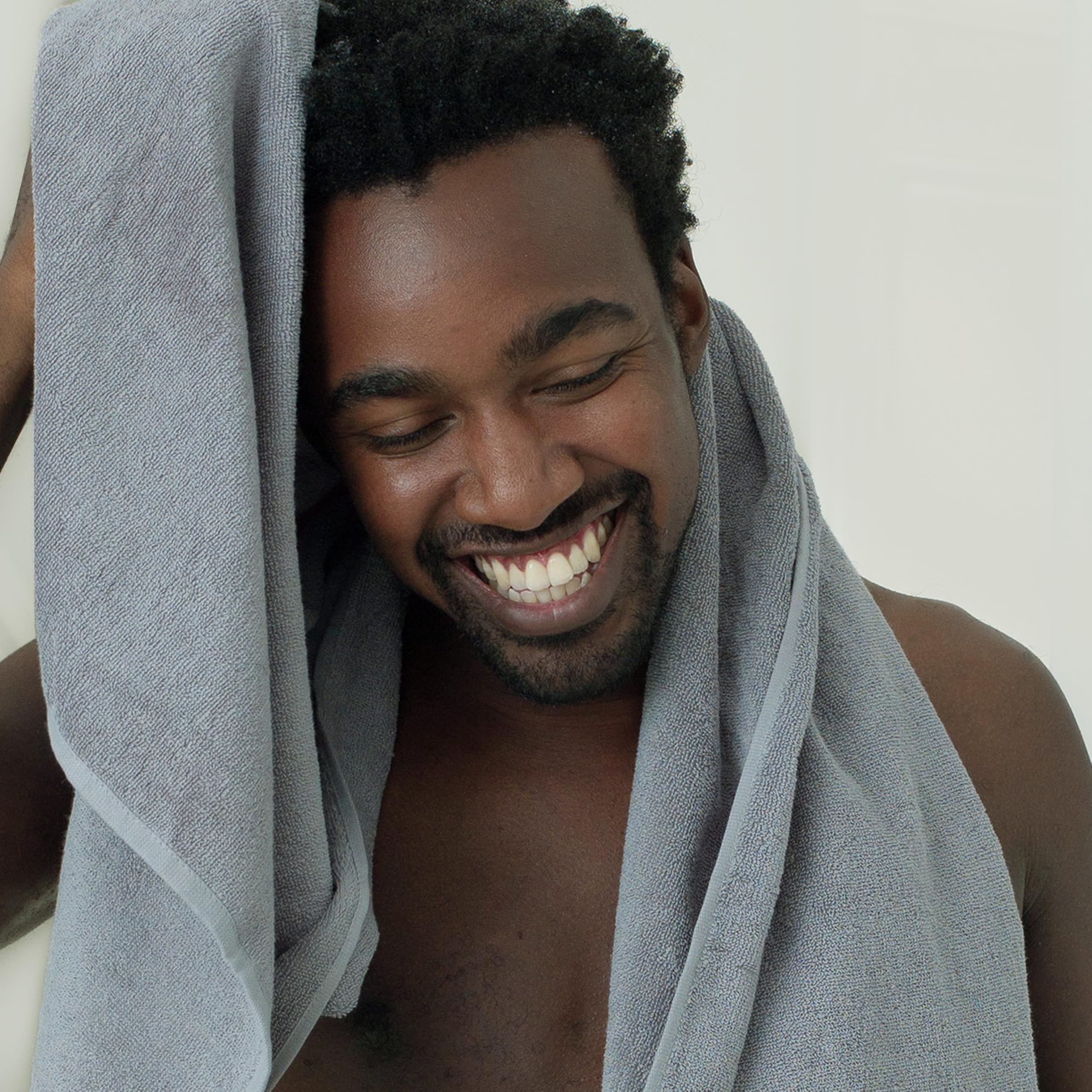DOVE MEN + CARE bergamot styling props conveying refreshing scent benefit