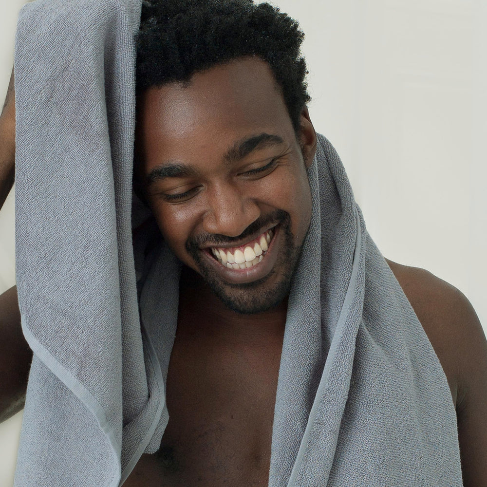 DOVE MEN + CARE bergamot styling props conveying refreshing scent benefit