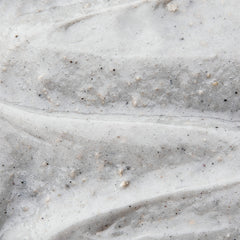 DOVE MEN + CARE charcoal and clay texture close-up demonstrating purifying action