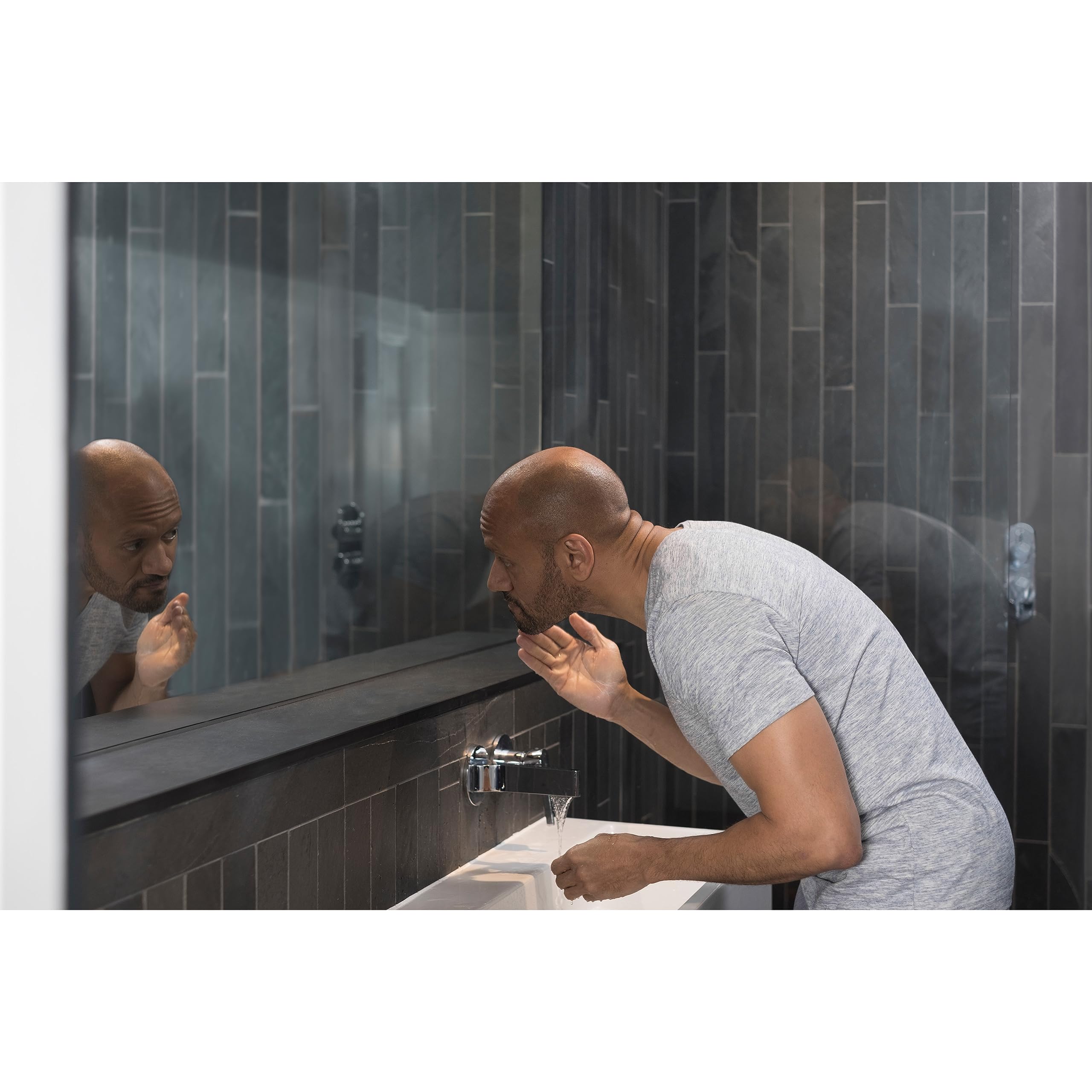 DOVE MEN + CARE lifestyle bathroom shelf displaying daily use