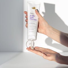 Dove bottle beside ruler showing 9 oz size and travel context