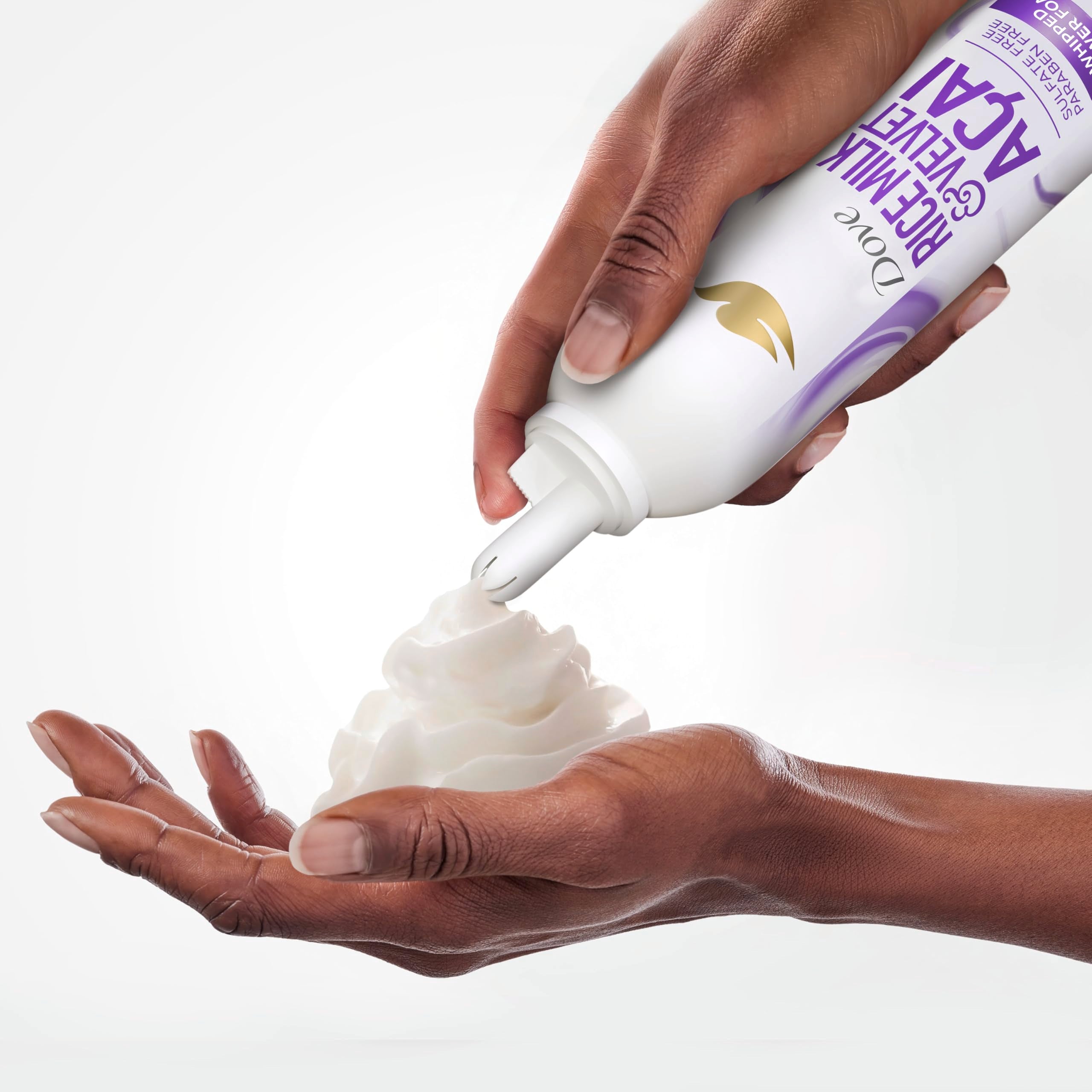 Person using Dove whipped shower foam in shower for smooth shaving