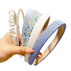 DOXISHRUKY front view of six blue headbands showing variety and gift-ready look