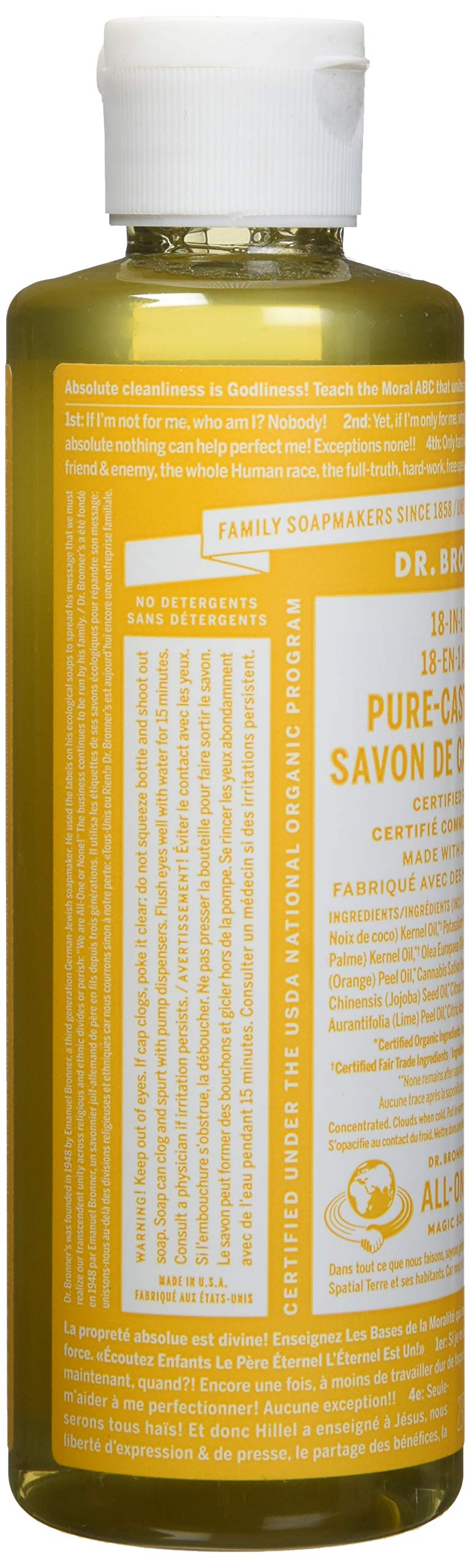 Dr. Bronner's Citrus Orange 8 fl oz bottle beside common items showing compact travel-friendly size