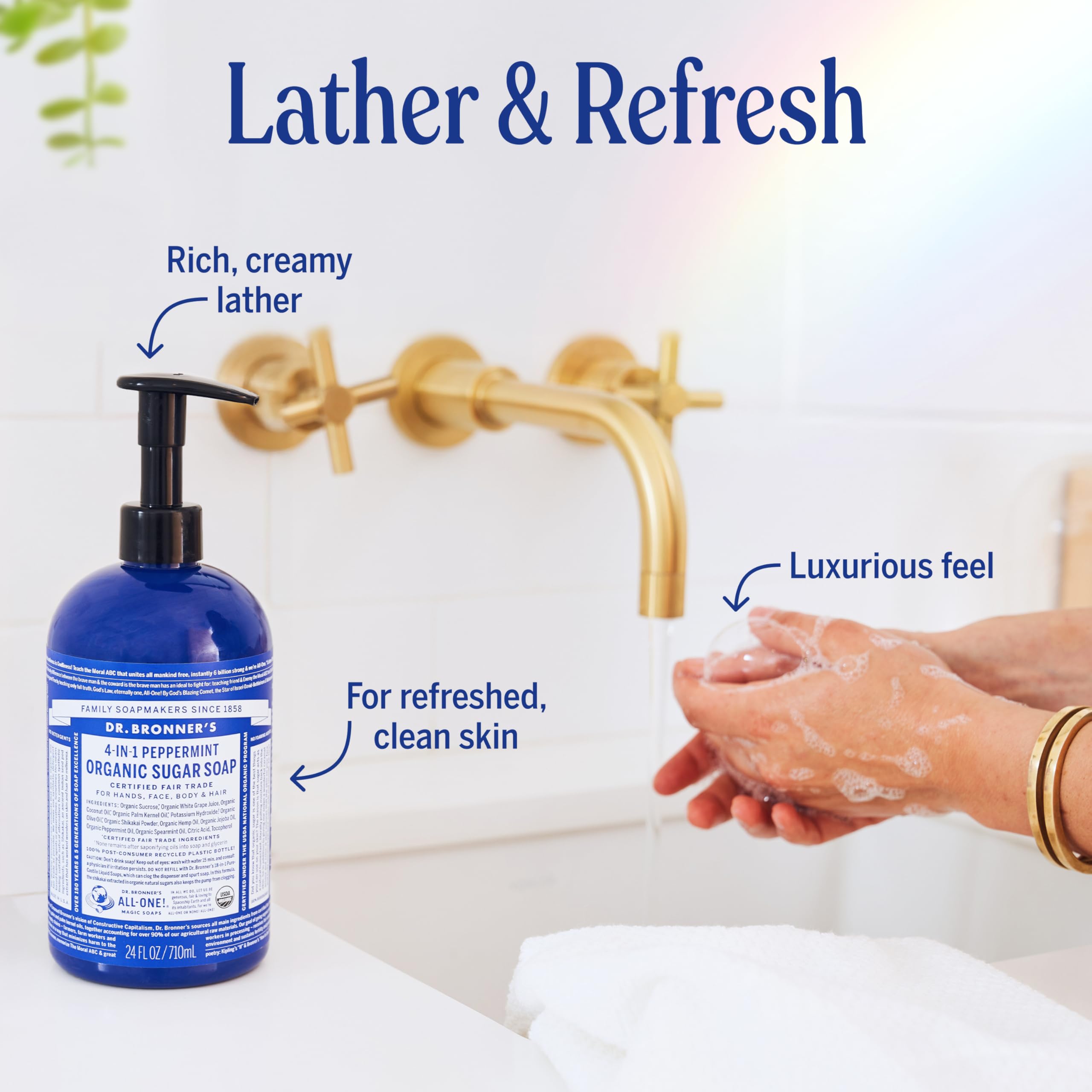 Hand lathering creamy foam with Dr. Bronner's peppermint soap for moisturizing cleanse