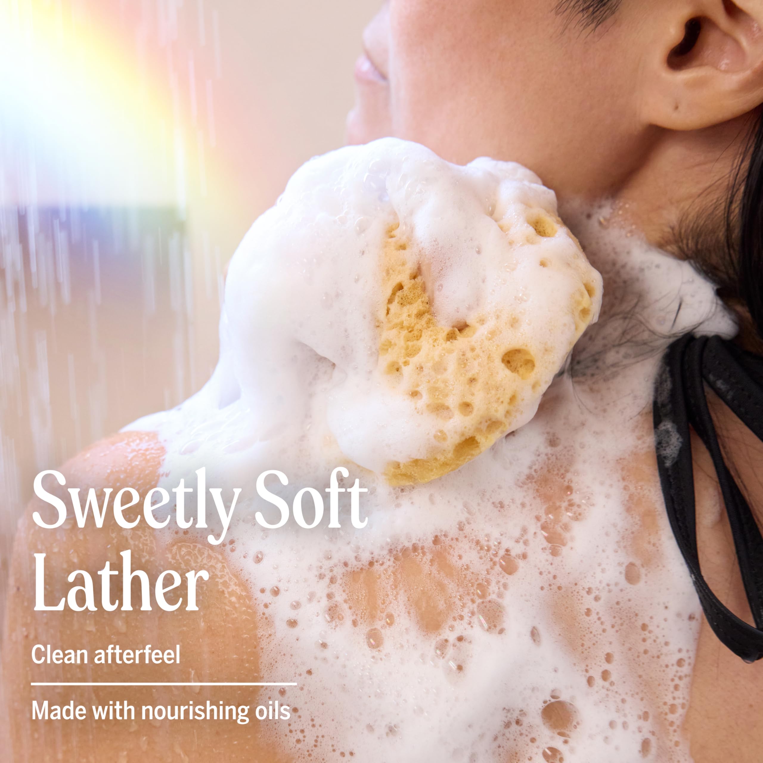 Applying Dr. Bronner's peppermint sugar soap to wet hair for gentle conditioning