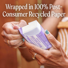 Dr. Bronner's lavender bar beside organic oils symbolizing plant-based ingredients