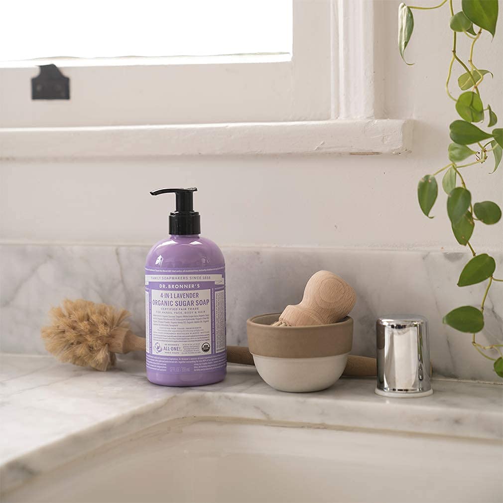 Creamy lather texture from Dr. Bronner's sugar soap, shows gentle moisturizing foam benefit